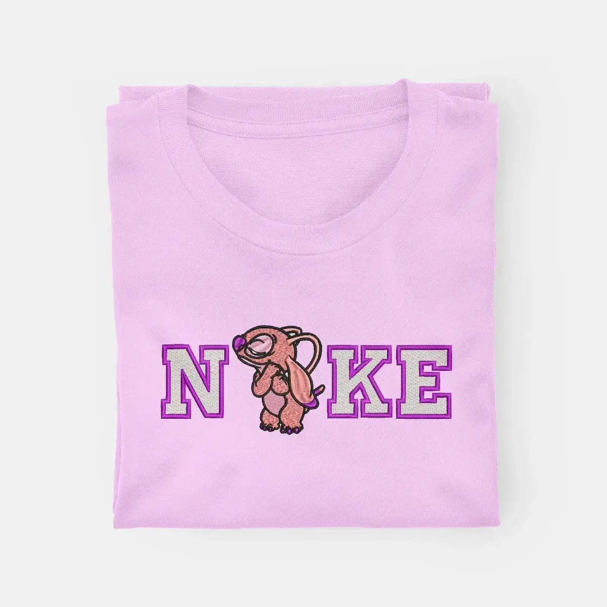 Camiseta-rosa-con-dibujo-divertido